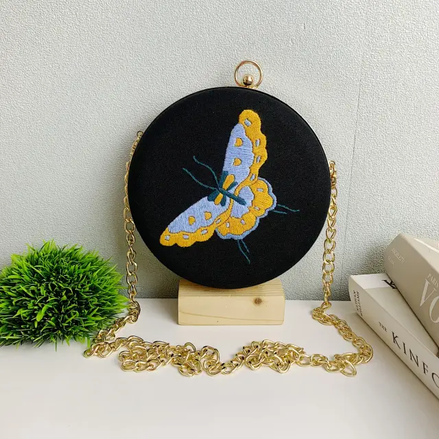 Clutch Bag Noir Amber Flutter