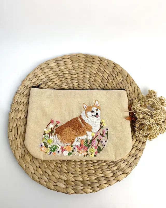 Pouch Corgi in the Wildflowers